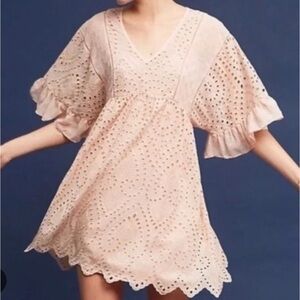 Anthropologie’s Akemi + Kin peach eyelet babydoll style dress 
Size 2